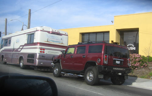 Giant RV towing giant Hummer
