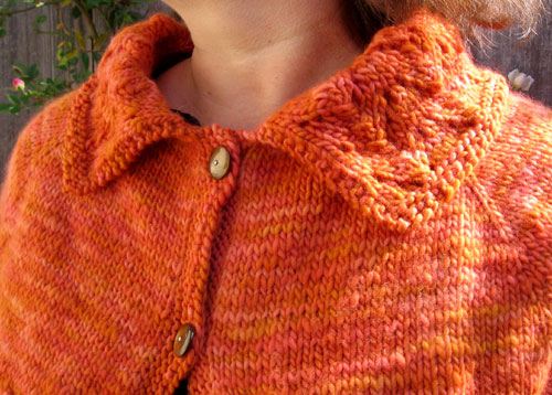 The lovely orange shrug, detail view